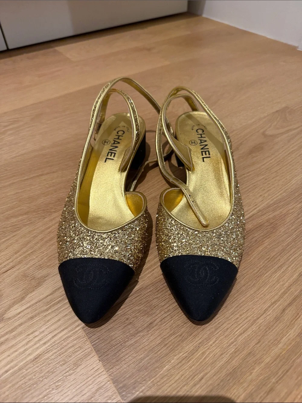 CHANEL Gold Glitter Slingback Mules with Black Cap Toe